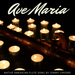 Native american flute sitting around tealight candles to be the cover of the song Ave Maria