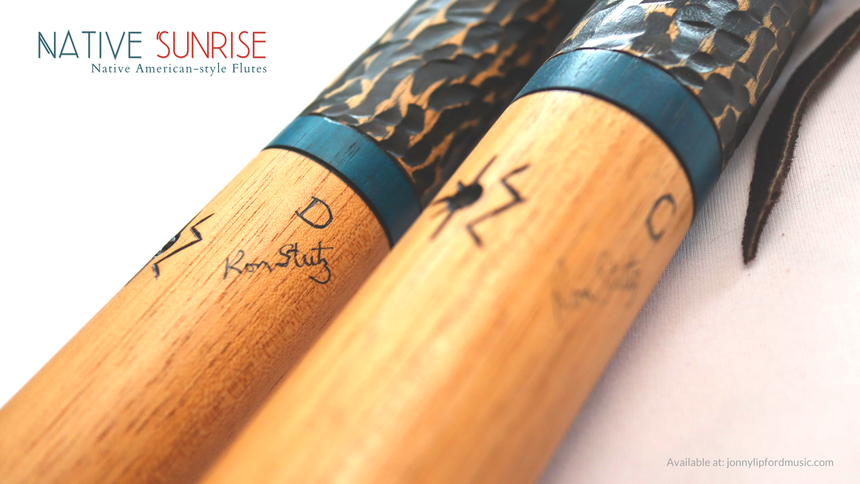 back of a native american flute showing Ron Stutz logo and signature