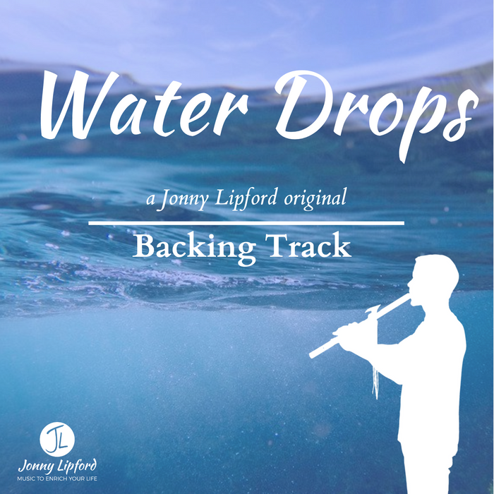 Jonny Lipford standing in front of water playing his Native American flute. This is the feature image for the product Native American Flute Backing Tracks