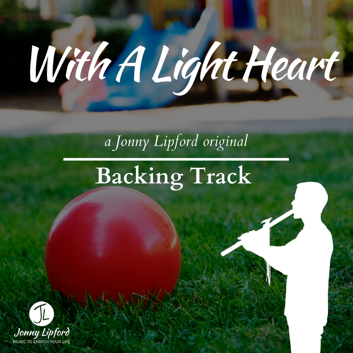 Jonny Lipford silhouette playing his native american flutes in front of a red ball on the playground. This is the product image for With A Light Heart Backing Tracks for Native American flutes.